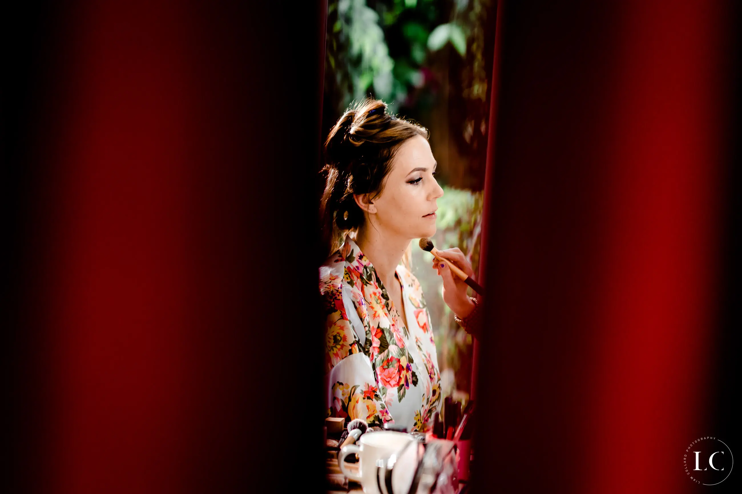 bride doing makeup