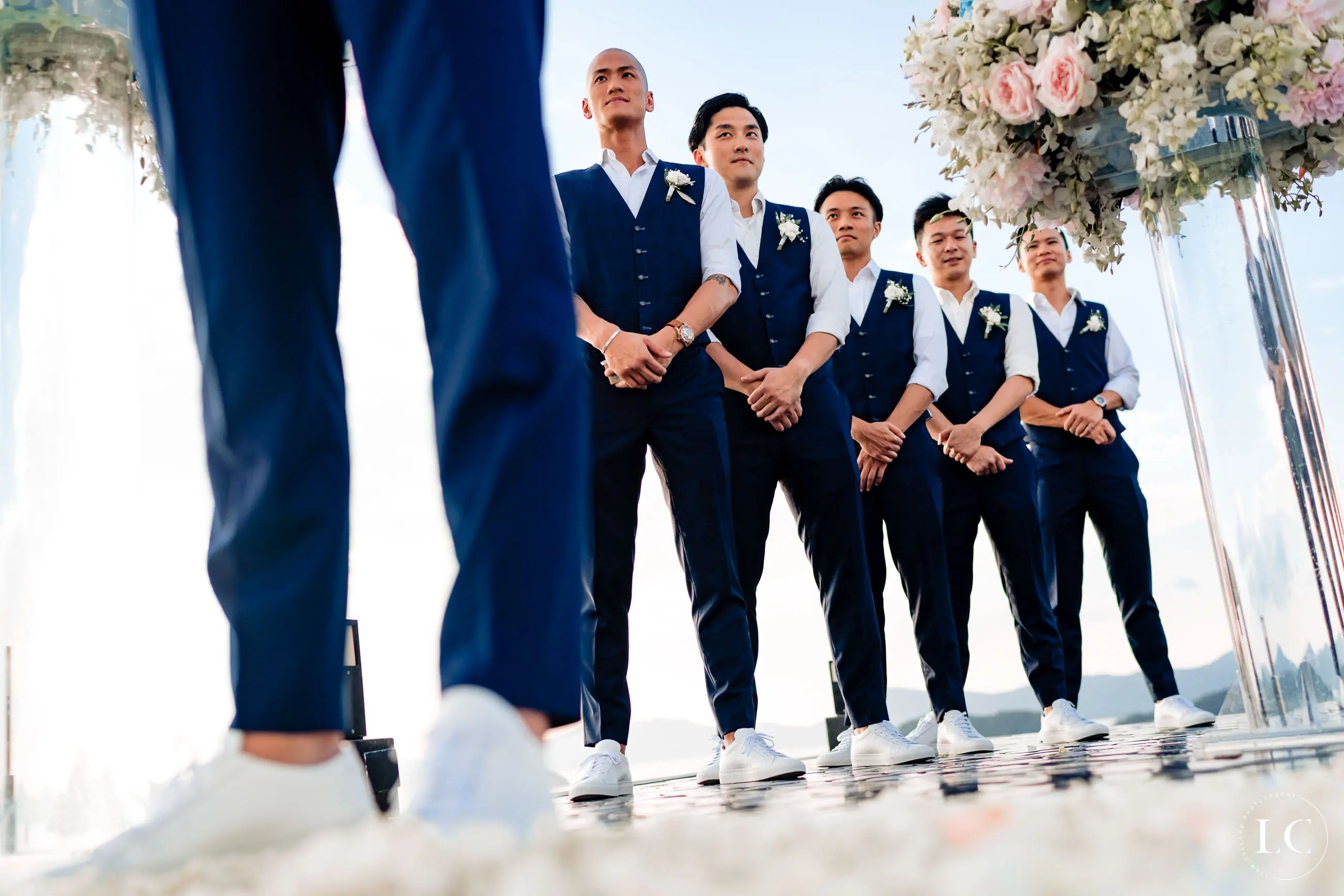 Groomsmen standing at the altar