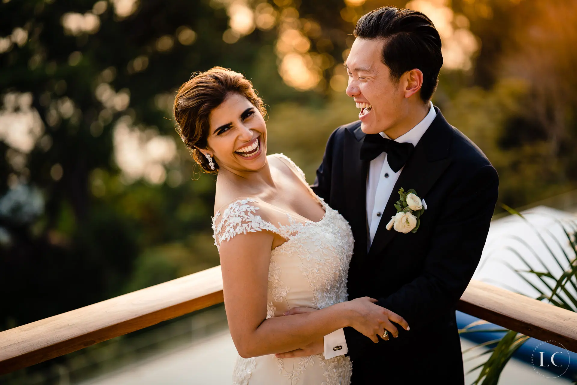 Bride and groom laughing