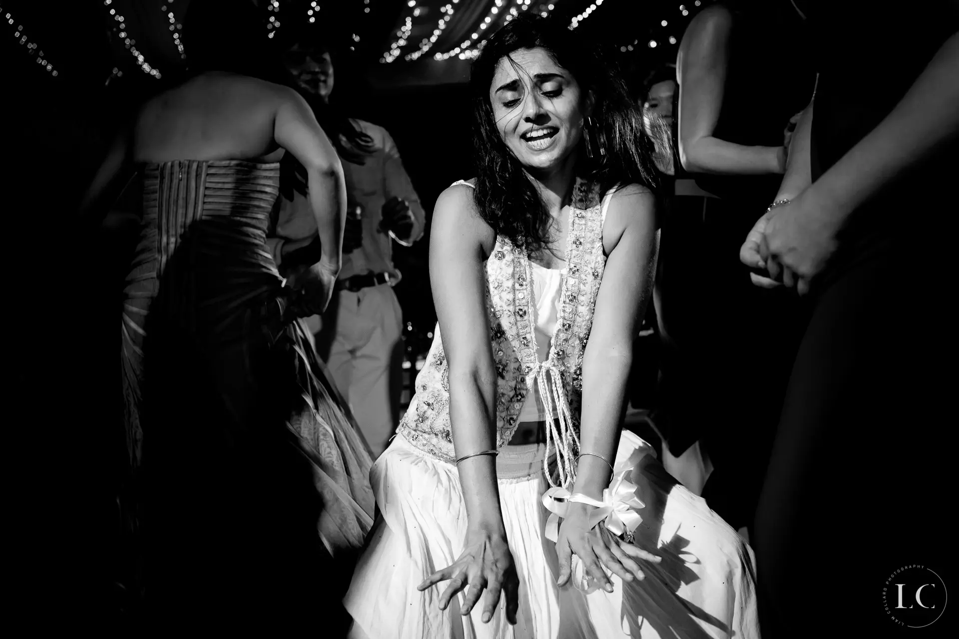 Bride smiling at wedding reception